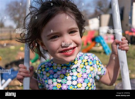 A Toddler Girl Playing Outside Stock Photo Alamy