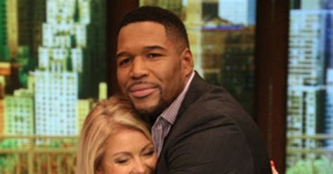 Michael Strahan Kisses Kelly Ripa Goodbye On Live With Kelly And