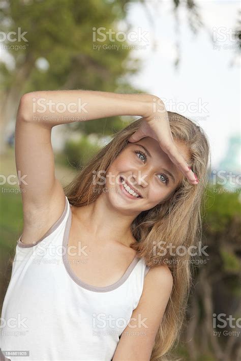 Beautiful Young Teenage Girl Cheerfully Smiling Posing Looking Away