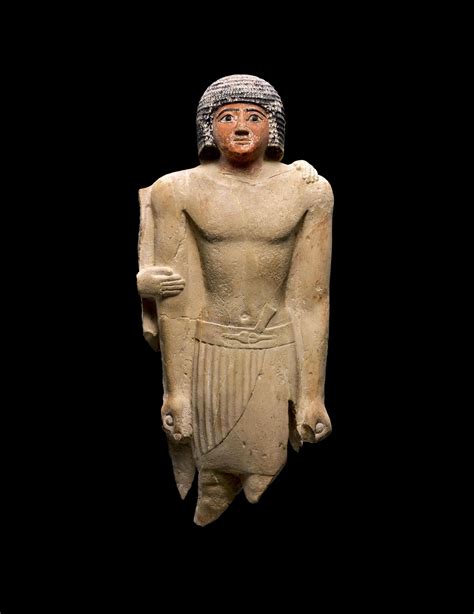 An Egyptian Limestone Figure Of A Man 5th Dynasty 2520 2360 Bc