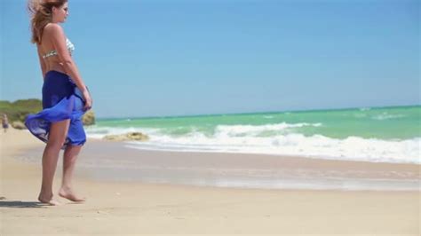 sexy woman walking on beach — stock video © motion pl 42613797