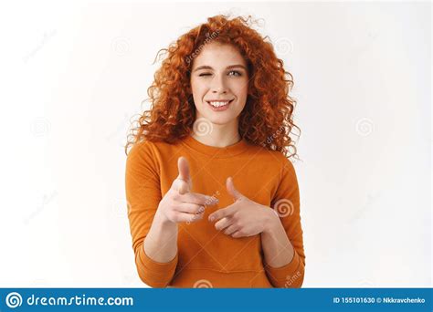 hey you are cool cheeky stylish redhead modern woman with curly haircut blue eyes standing