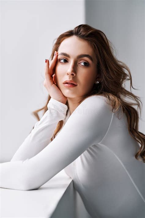 Close Up Portrait Of Sensual Pretty Young Woman In White Clothes Stock