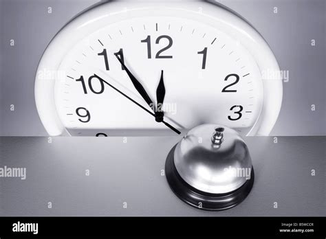 Wall Clock And Call Bell Stock Photo Alamy
