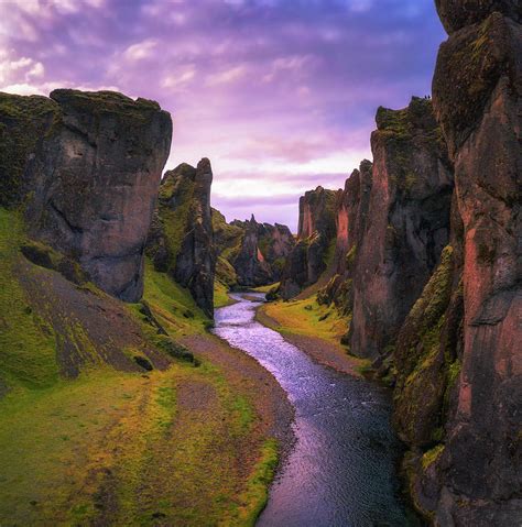 Fjadrargljufur Canyon And River Flowing Along Its Bottom In Iceland At