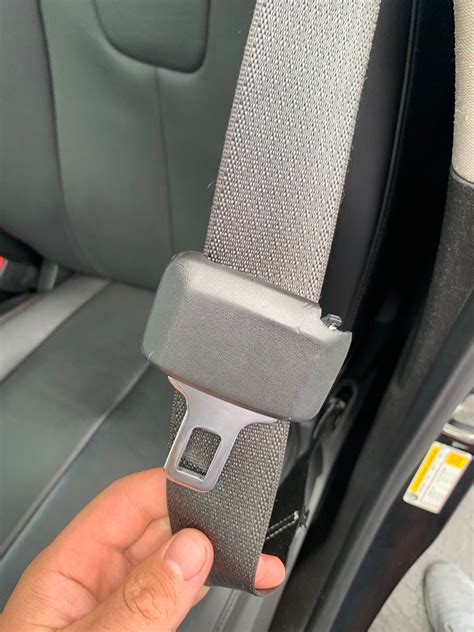 how to remove a seat belt buckle