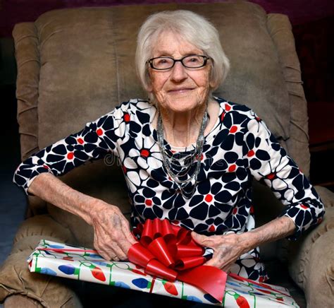Christmas For Elderly Granny Brings Sparkle To Her Eyes Stock Photo