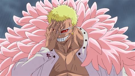 An Anime Character With Blonde Hair And Big Pink Flowers On His Head
