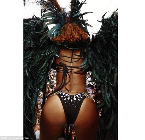 rihanna shows off her curvy figure as she parties at barbados carnival daily mail online