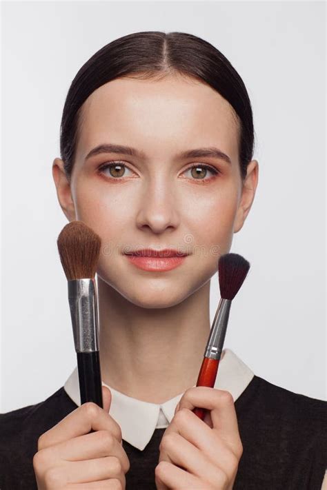 Beautiful Woman Holds Makeup Brushes Stock Image Image Of Attractive