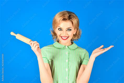 Happy Housewife With Rolling Pin Woman In Pin Up Style Holds Rolling