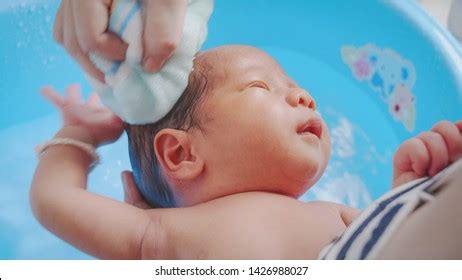 Baby Newborn Unrecognizable Mother Bathing Her Stock Photo