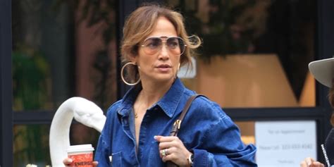 Jennifer Lopez Wore A Denim Dress With Two Nearly Waist High Leg Slits Patabook Fashion