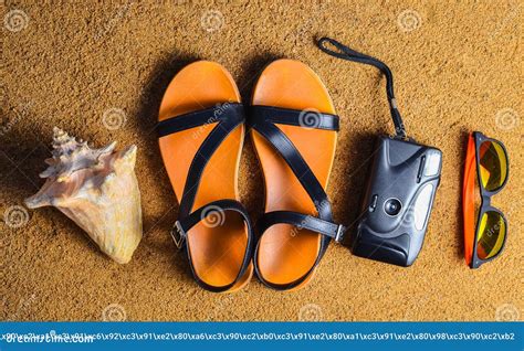 Beach Accessories Lie On The Sandcamera Sandals Sunglasses