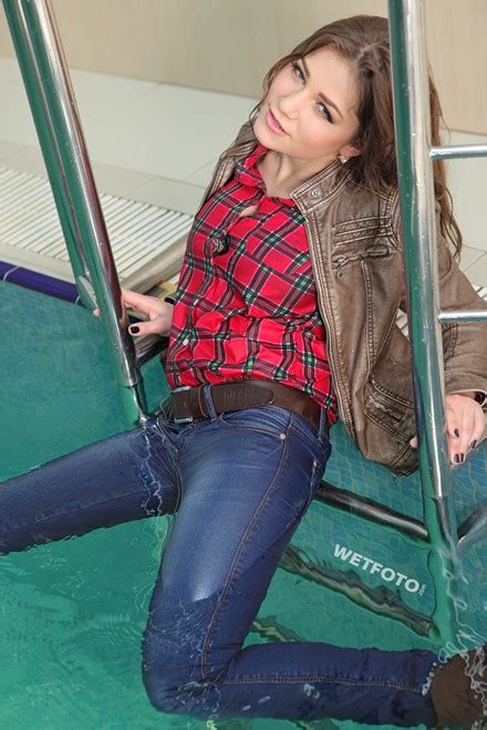 Beautiful Girl In Leather Jacket Tight Jeans And Boots In Pool