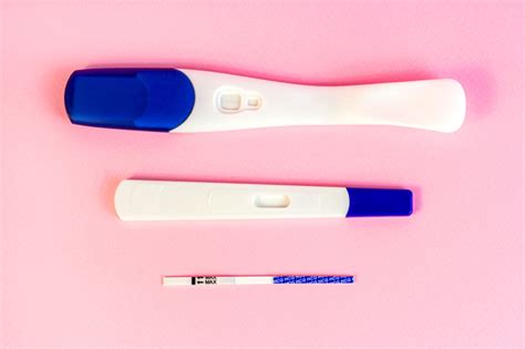 Different Types Of New Pregnancy Tests For Woman On Light Pink Background Photo Image