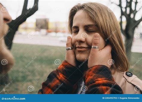 A Man Caresses The Face Of His Beloved Outside Stock Image Image Of