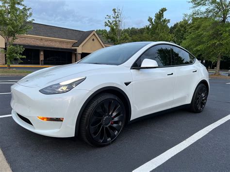 2022 white tesla model y performance