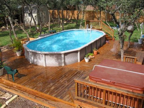 25 Top Oval Above Ground Swimming Pools Design With Decks Swimming