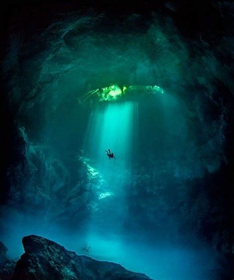 Diving Into A Deep Sea Cavern Underwater Caves Underwater