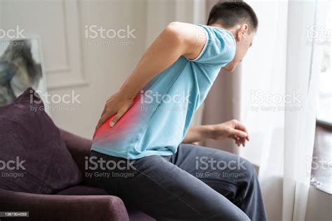 Back Pain Kidney Inflammation Man Suffering From Backache At Home Stock