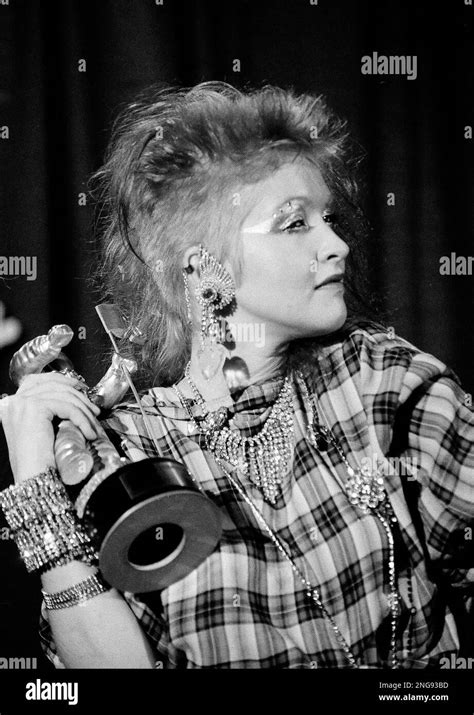 singer cyndi lauper poses with her award for best female video at the mtv music awards in new