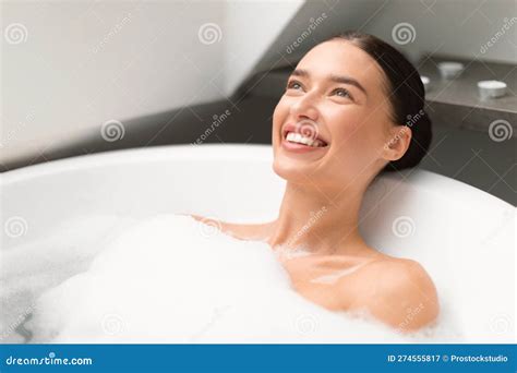 Cheerful Lady Taking Bath Lying In Foam Bubbles In Bathroom Stock Image Image Of Hygiene