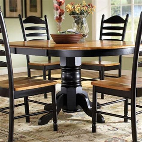 Lavezzi chairs' legs are dark chestnut mahogany that contrats with the seat to give some panache. Pedestal Kitchen Table | Furniture, Dining room furniture ...
