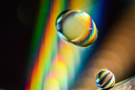 Light Diffraction Showing Rainbows On Water Drops Stock Image Image