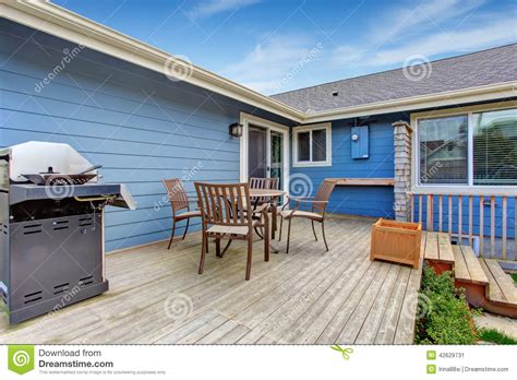 House Backyard With Patio Area On Walkout Deck Stock Image Image Of