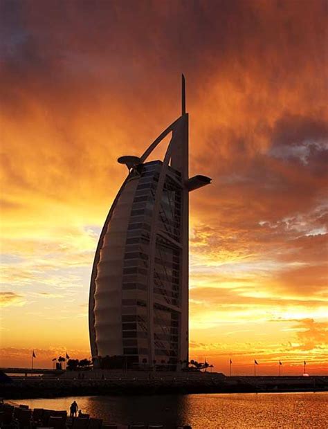 Dubai Uae Burj Al Arab At Sunset Luxury Hotel Built On An Artificial