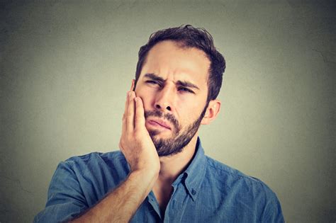 Zapalenie okostnej zęba objawy przyczyny leczenie domowe