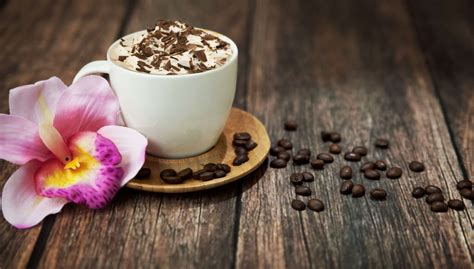 bigstock-Cup-of-hot-coffee-and-flower-40632406 - Halls Apple Market