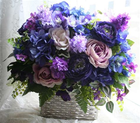 Welcome to our canada flowers sympathy arrangements catalogue, featuring flowers recommended to yellow and purple flowers in a ba. extravagant flower arrangements | Purple Flower ...