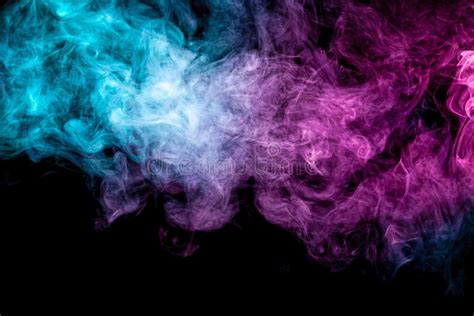 Abstract Art Colored Blue And Pink Smoke On Black Isolated Background