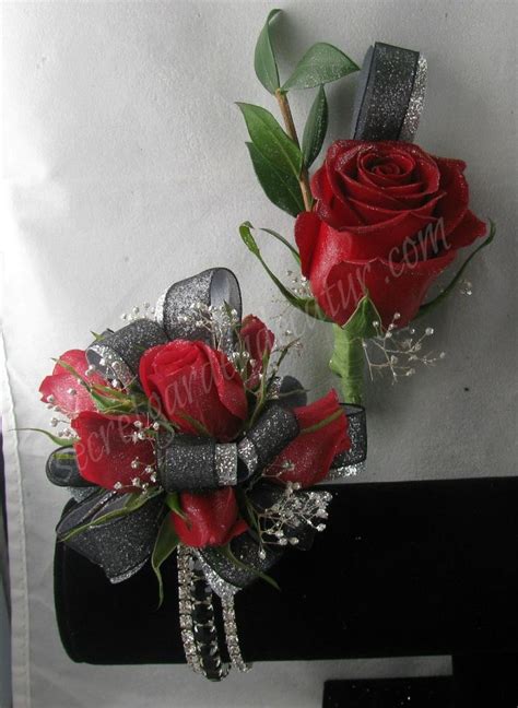 Wrist corsage has white roses, black and gold ribbon and pearly beads on golden wire. Deep Red Roses with silver and black ribbon. The bracelet ...