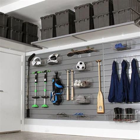 Keep brooms, mops and dustpans off the floor and out of the way by crafting a handy organizer out of scrap wood and pipe straps. 100 Garage Storage Ideas for Men - Cool Organization And Shelving