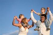 Dad and mom with children stock image. Image of parenthood - 3358465