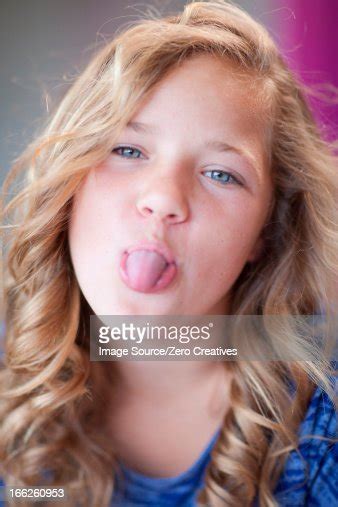 Girl Sticking Her Tongue Out Photo Getty Images