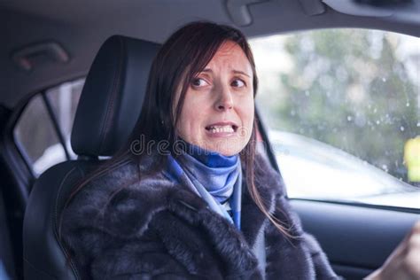 Beautiful Brunette For The First Time For Driving A Car Fright On Her Face Stock Image Image