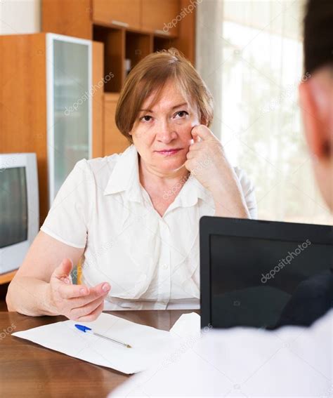 Mature Woman Answer Questions Of Worker Stock Photo Jim Filim 75049765