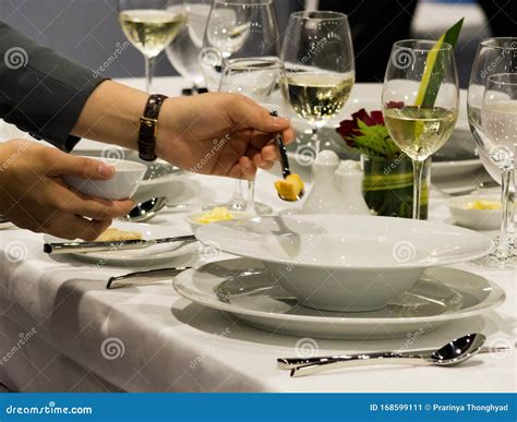 Table Side Service At A Fine Dining Restaurant Waiter Serving Dishes