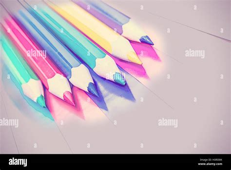 Colorful Pencils On Colored Paper Stock Photo Alamy
