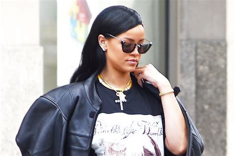 Rihanna Makes A Statement In Manolo Blahnik Denim Boots Photos