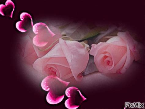 Coucher de soleil dans les mains du cœur. Des roses de mon coeur,merci de ce beau partage de coeur ...