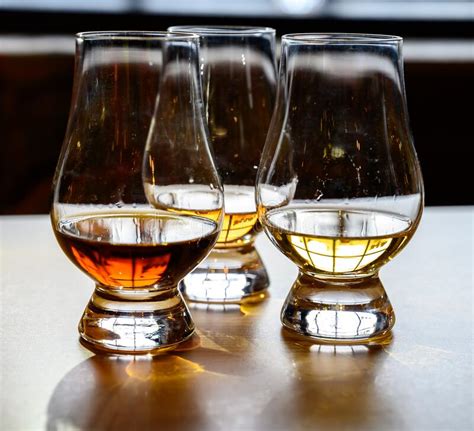Scotch Whisky Tasting Glasses With Variety Of Single Malts Or Blended Whiskey Spirits On