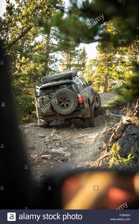 Overland Adventure Suvs On Remote Rugged Road Stock Photo Alamy