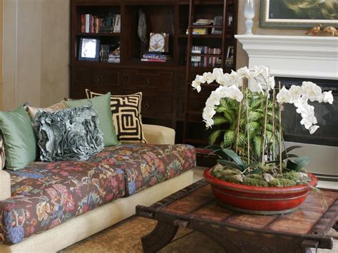 The vintage floral sofa is the focal point of this living room, gathering. Patterned Sofas | Living Room and Dining Room Decorating ...