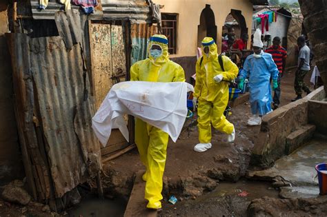 intense photos from sierra leone capture the ebola crisis the world virtually forgot
