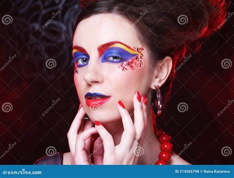 Portrait Of Young Brunette Woman With Artistic Make Up Close Up
